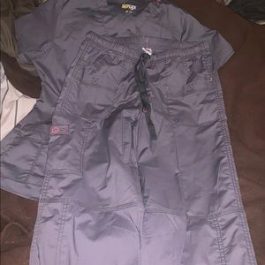 Medium size scrub top. Small size scrub bottoms.